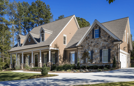 Gorgeous custom home on a private lot with 3 car garage, full basement, and large outdoor living space with outdoor kitchen & outdoor fireplace. This new construction home features 4 bedrooms and 3.5 bathrooms, and a large covered front porch with custom stacked stone accents, gas lanterns, and a flagstone patio.