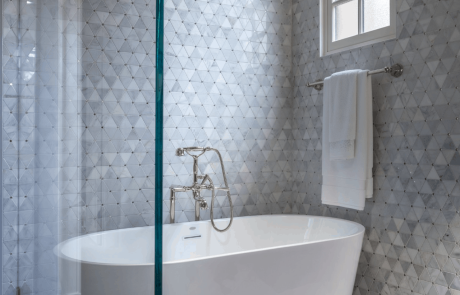 Wet Room with Freestanding Soaking Tub, Polished Nickel Fixtures, Porcelain Tile Floor and Mosaic Marble Tile